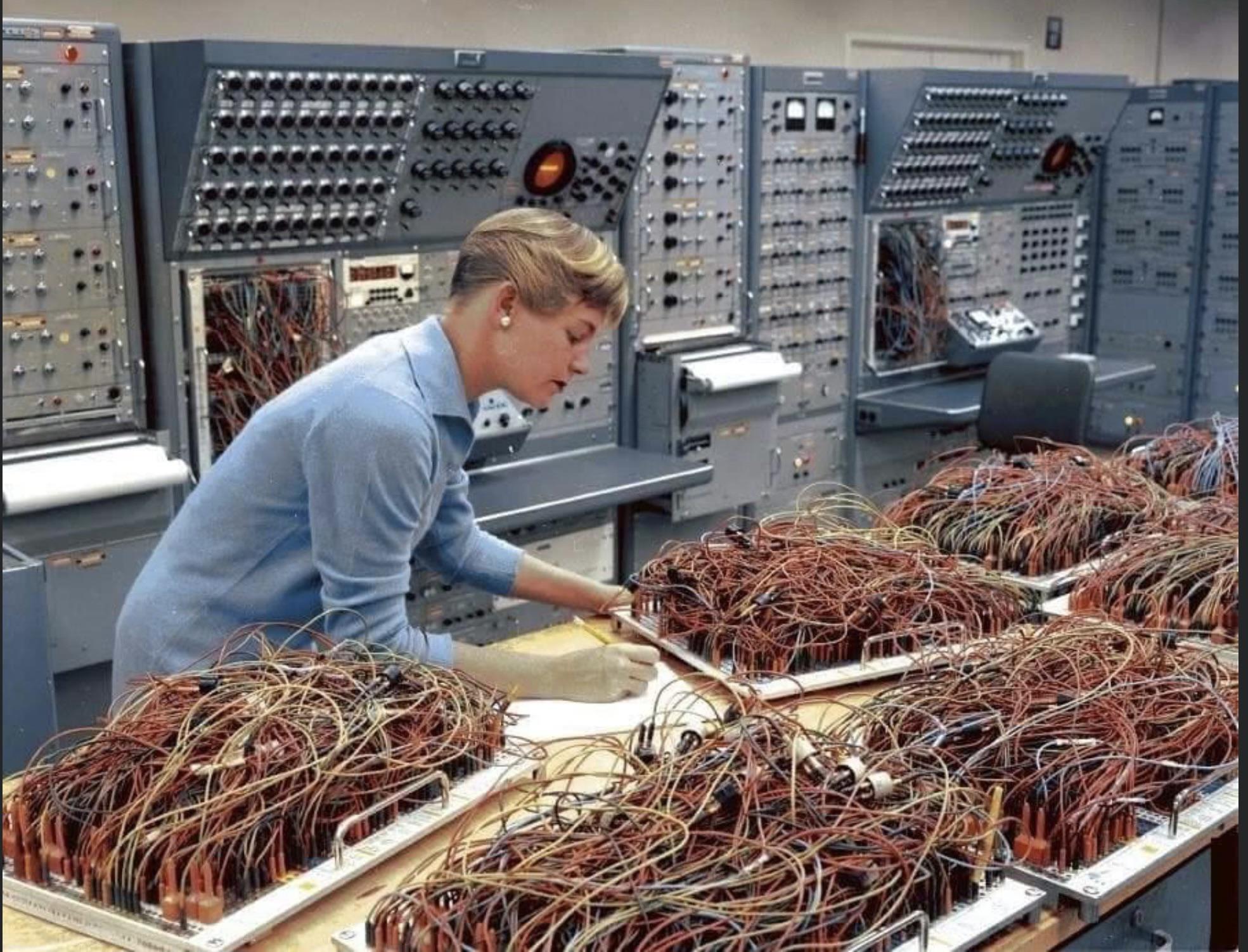 Amid the early computer age, engineers, often women in supporting roles, managed vast tangles of wiring by hand.